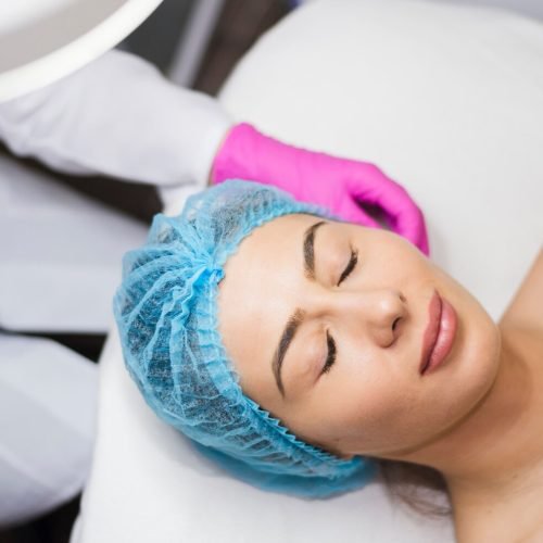 girl-receiving-facial-treatment-beauty-salon_23-2148194166